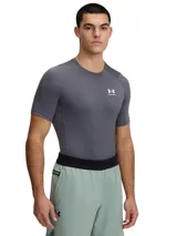 Remera deportiva blanca Under Armour HeatGear Armour de manga corta, corte ajustado y logo negro en el pecho.