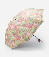 Paraguas plegable de aluminio con estampado de bananas, naranjas y melones sobre fondo lila. Incluye correa de mano y funda protectora.