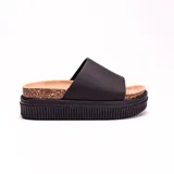 Sandalia negra con plataforma de corcho y suela de goma antideslizante.