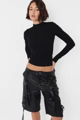 Top de morley manga larga gris, al cuerpo; largo camiseta.
