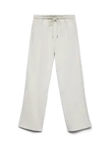 Pantalón de jogging color gris claro, de corte amplio, con cintura elástica ajustable con cordón y bolsillos laterales.
