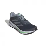 Championes Adidas Response grises con detalles plateados y suela blanca con detalles en verde.