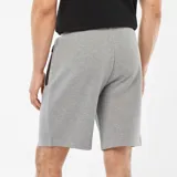 Bermudas deportivas grises con bolsillos laterales con cierre.