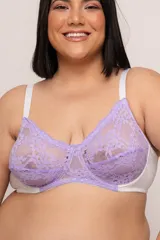 Soutien reductor con aro, confeccionado en lycra y puntilla elastizada. Breteles elásticos regulables y broches reforzados regulables en espalda. Diseño con copas de encaje floral color lila y laterales blancos.