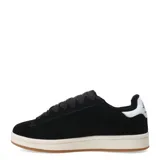 Championes urbanos negros con detalles en blanco, suela color crema y logo en el lateral.