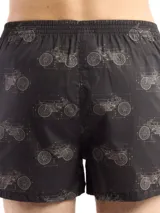 Bóxer de algodón blanco con estampado de flores pequeñas color celeste, con cintura elástica y logo de la marca en el centro.