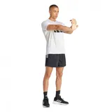 Remera de running Adidas, color blanco con logo de la marca en negro.