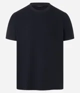 Remera verde oscuro de corte slim, cuello redondo y manga corta. Confeccionada en algodón texturizado.
