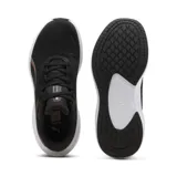 Championes Puma Skyrocket Lite de mujer, color negro con logo en color cobre y suela blanca.