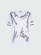 Remera blanca de algodón con estampado de letras en negro con la frase "mon amour" y "je t'aime" y el nombre de la marca Balmain.
