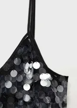 Vestido largo de fiesta con lentejuelas plateadas y negras, tirantes finos ajustables, escote en V y forro interior.
