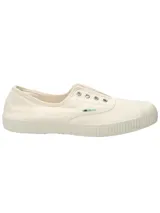 Zapatillas de lona color crudo, sin cordones, con puntera reforzada de goma y suela vulcanizada.
