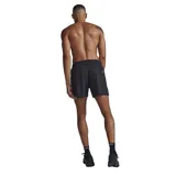 Short de entrenamiento negro, liviano y flexible, con entrepierna de 5 pulgadas, cintura elástica y bolsillos laterales.