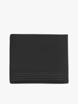 Billetera Tommy Hilfiger de cuero granulado color negro, con diseño plegable, múltiples ranuras interiores para tarjetas, bolsillo interior para monedas y logo metalizado en la parte delantera.