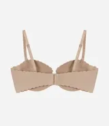 Soutien femenino liso color piel, modelo top sin tirantes, con relleno y borde festoneado.