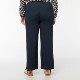 Pantalón ancho azul marino de punto gofrado con textura.