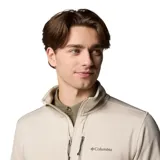 Campera polar Columbia Park View Fleece, color azul jaspeado, con cierre frontal completo, cuello alto, bolsillos laterales con cierre y bolsillo en el pecho con cierre vertical en color verde lima. Cuenta con tecnología Omni-Wick, puños elásticos con orificios para pulgares y protector de barbilla.