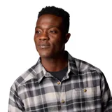 Camisa de franela a cuadros gris, negra y beige, de manga larga, con bolsillo en el pecho y tejido elástico.