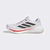 Championes Adidas Supernova Rise 2, color blanco con detalles en negro y rojo, ideales para running.