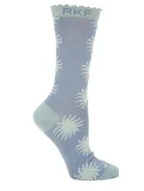 Calcetines de media caña color celeste con estampado de soles blancos y detalles en verde agua en puntera, talón y borde superior. Presentan la inscripción 'RKF' en el borde superior.