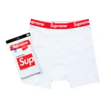 Bóxer blanco de la marca Supreme, con elástico rojo en la cintura y corte clásico.