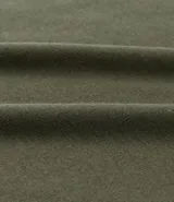 Blusa tipo muscle tee color turquesa, hecha en ribana de viscosa y poliéster, con escote redondo y sin sisas.