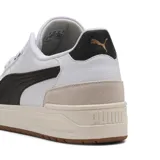Championes Puma Shuffle Downtown OG, color blanco con detalles en negro y beige.