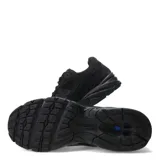 Championes New Balance modelo 509, color negro, con capellada de malla y superposiciones de gamuza. Presenta el logo 'N' en el lateral y detalles de amortiguación visible en el talón.