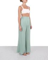 Pantalón verde de corte palazzo con cintura elastizada.