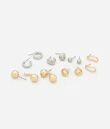 Set de seis pares de aros de metal con baño mixto dorado y plateado. Incluye aros tipo argolla, aros con forma orgánica, aros con forma de esfera, aros con forma de nudo y aros con forma geométrica.