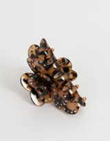 Broche para el pelo color carey con forma de flor y apliques de strass.