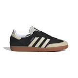 Championes Adidas Samba OG, color negro con detalles en beige y suela de goma marrón.