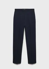 Pantalón de vestir azul marino con corte cigarette, tiro medio y ruedo con dobladillo.