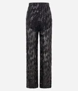 Pantalón pantalona de fiesta con cintura elástica y forro de short. Confeccionado en lentejuelas metalizadas con diseño geométrico.