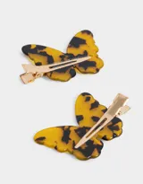 Set de dos hebillas para el pelo con forma de mariposa, confeccionadas en acrílico con diseño carey.