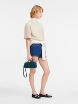 Bolso Longchamp Daylong con asa superior, color azul.