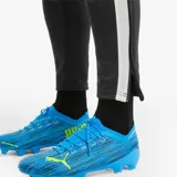 Pantalón negro de hombre, con detalles en blanco y ajuste elástico en cintura, de la marca Puma.