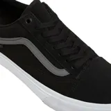 Championes negros con detalles en gris y suela blanca, modelo clásico de Vans.