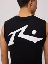 Musculosa blanca de algodón sin mangas, corte holgado y logo estampado en el pecho.