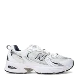 Championes New Balance 530 de running unisex, color blanco con detalles plateados y azules.