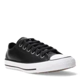 Championes Converse All Star Chuck Taylor de cuero negro con suela de goma blanca.