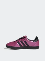 Zapatillas Adidas Samba LT color rosa metalizado con detalles en negro.