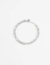 Pulsera de acero quirúrgico hipoalergénico color plateado, con doble cadena: una de eslabones pequeños y otra de eslabones rectangulares más grandes.