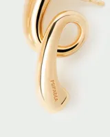 Aros dorados con forma de gancho y detalle de la marca PD Paola.