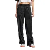 Pantalón Adidas Firebird negro con tres tiras blancas laterales y logo bordado en blanco.
