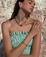 Collar de alpaca con cuentas de labradorita, jaspe rojo y cuarzo lima. Incluye una estrella de mar realizada a mano y una perla de río natural.