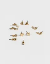 Set de seis pares de aros pasantes dorados con diferentes diseños: esferas, símbolo de infinito, strass, mariposas y eslabones.
