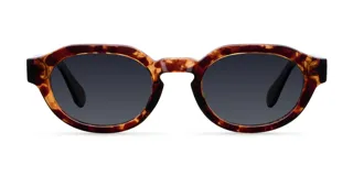Gafas de sol unisex con montura carey geométrica, lentes polarizadas negras con protección UV400, varillas sobresalientes y diseño retro-chic.