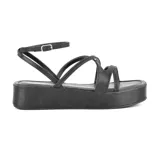 Sandalias negras con plataforma, tiras finas y pulsera con hebilla al tobillo.