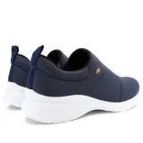 Championes deportivos casuales Usaflex Larisa color piel con suela blanca.